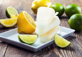 Popsicles with lemons and limes