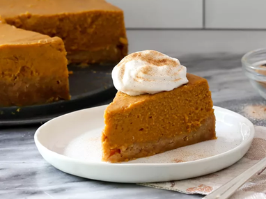Instant Pot Pumpkin Pie with a dollop of whipped cream 