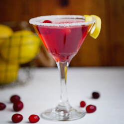 Limoncello Cosmo with cranberries and lemons