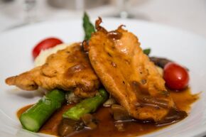 Chicken Marsala with asparagus and tomatoes