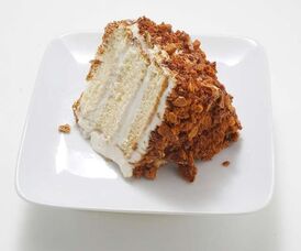 Piece of Coffee Crunch Cake on a white plate